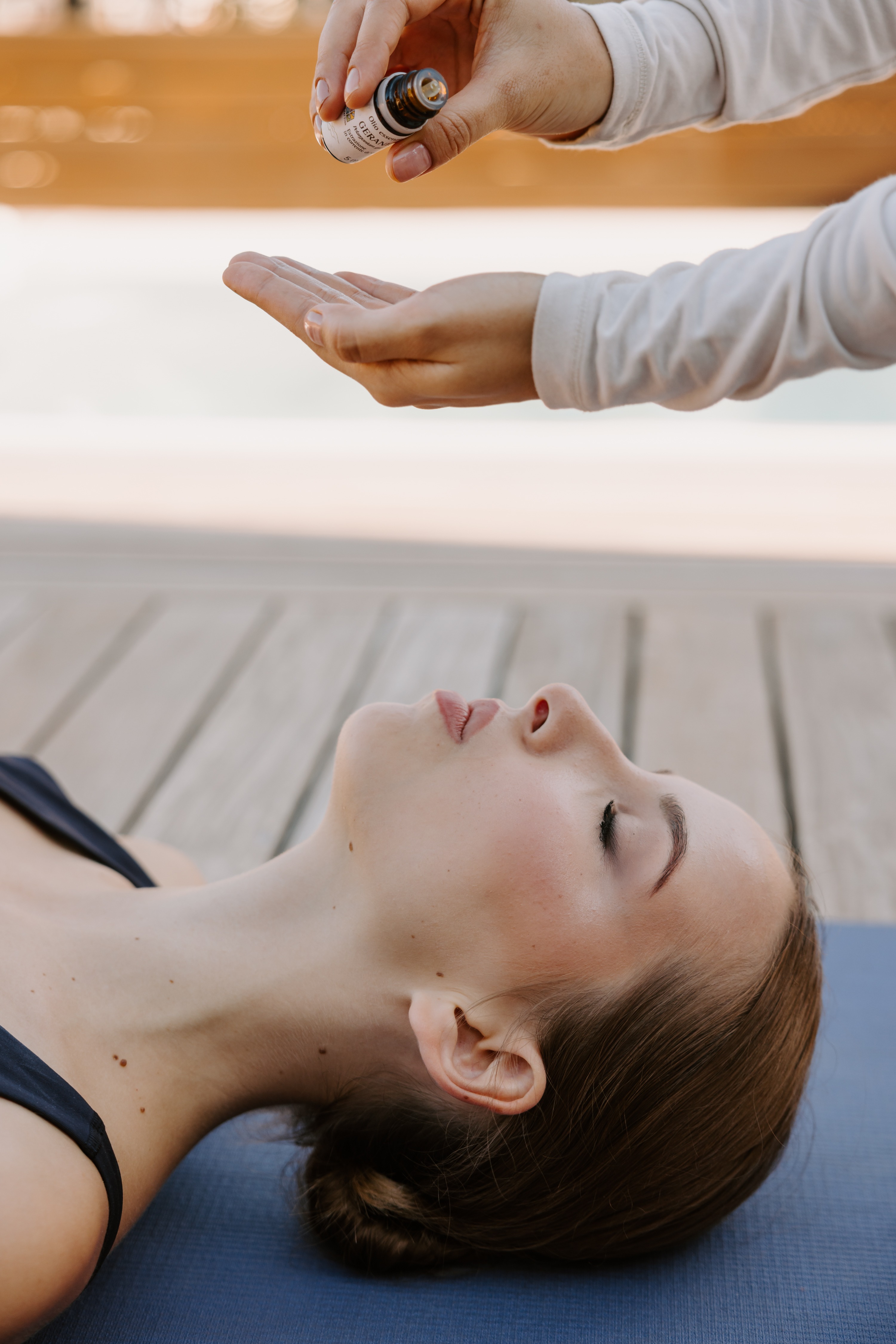 Aromatherapy treatment with essential oils during yoga relaxation session