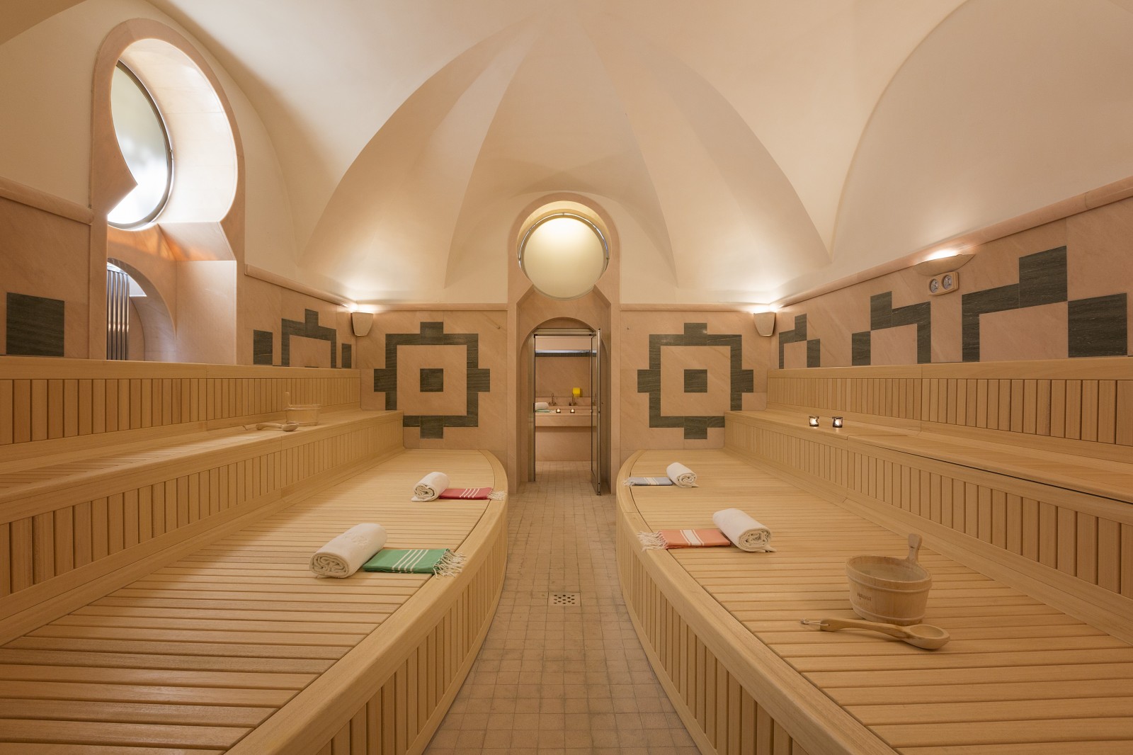 Traditional sauna with vaulted architecture and geometric decorations